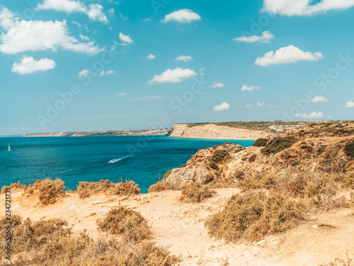 Ocean Landscape With Rocks And Cliffs At Lagos Bay Coast In Algarve  Portugal