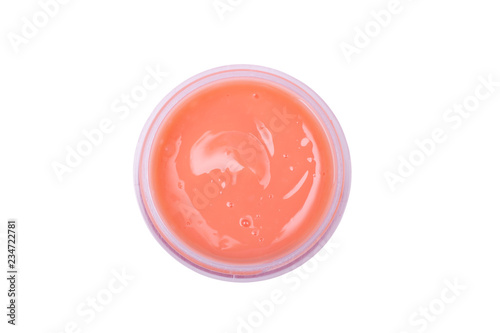 Natural face mask. Carrots, cranberry and tomato oil for skin care. Top view. Isolated on white background