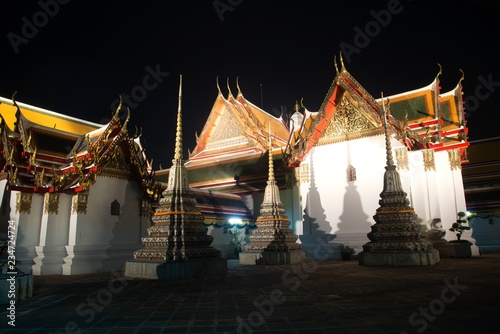 Scenic view colorful tile stupa decorate in wat pho Bangkok ,Thailand at night.
