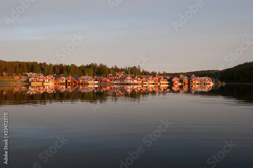 red houses at sunset in the...