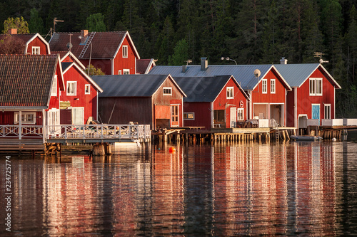 red houses at sunset in the...