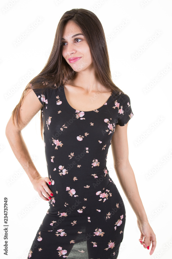 Beauty fashion portrait smiling young woman on dress and white wall background Beauty fashion portrait smiling young woman on dress and white wall background