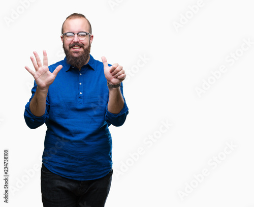 Young caucasian hipster man wearing glasses over isolated background showing and pointing up with fingers number six while smiling confident and happy.