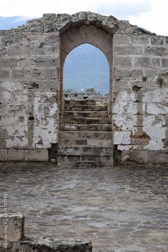 Obraz premium Antique arches. Ruins of an ancient castle(fragment). Kyrenia castle.The Turkish Republic Of Northern Cyprus