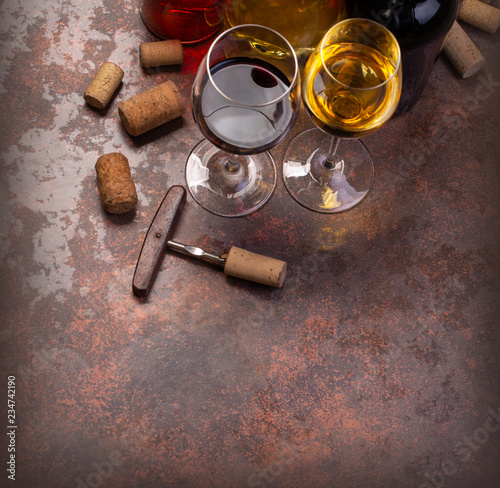 wine bottles and glass on table with copy space