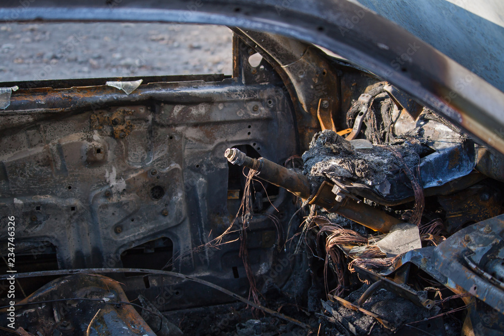 Closeup interior photo of a burnt out car