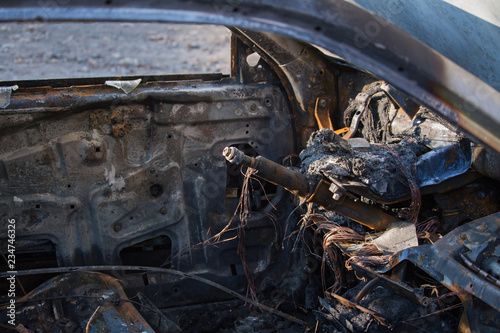 Closeup interior photo of a burnt out car