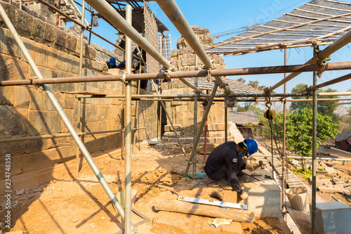 Restoration works at the Phnom bakheng Temple in Angkor. photo