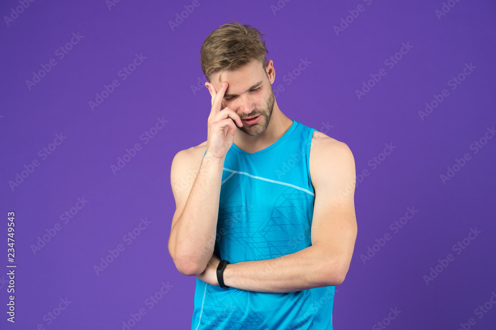 What is on his mind. Man with strong muscular arms. Man muscular