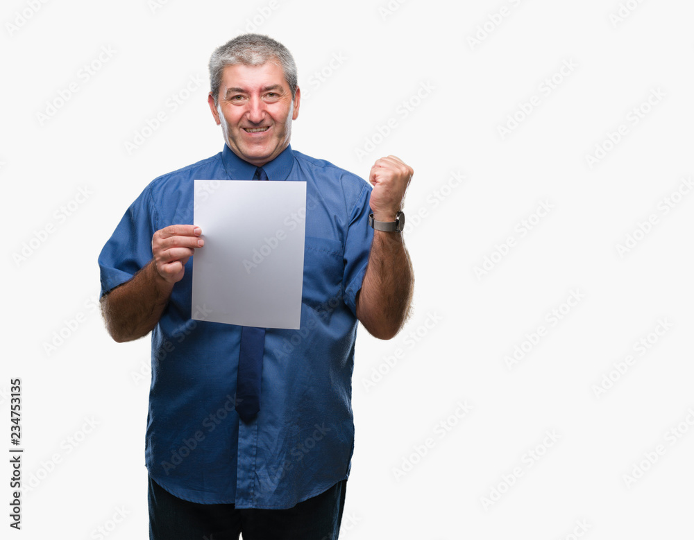 Handsome senior man holding blank sheet paper over isolated background screaming proud and celebrating victory and success very excited, cheering emotion Handsome senior man holding blank sheet paper over isolated background screaming proud and celebrating victory and success very excited, cheering emotion