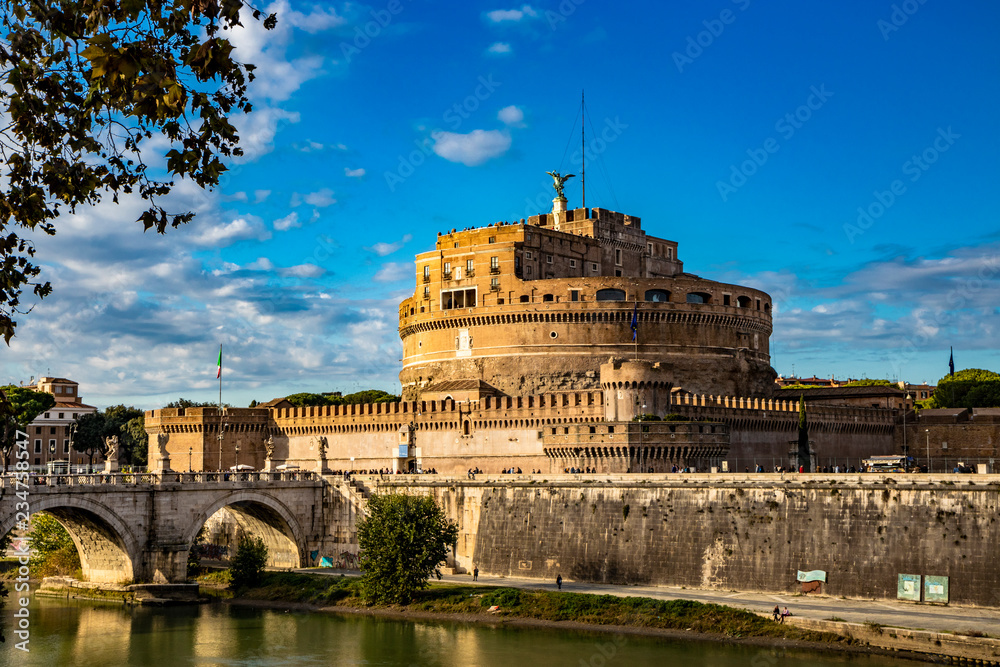 The Mausoleum of Roman Emperor Hadrian, usually known as Castel Sant'Angelo, with the eponymous bridge and the river Tiber, in Rome, near the Vatican. It was used by the popes as a fortress and castle