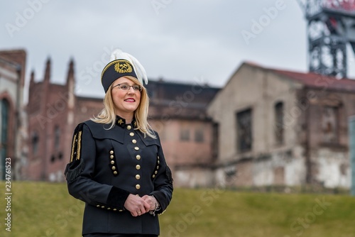 Woman black coal miner foreman in gala parade uniform