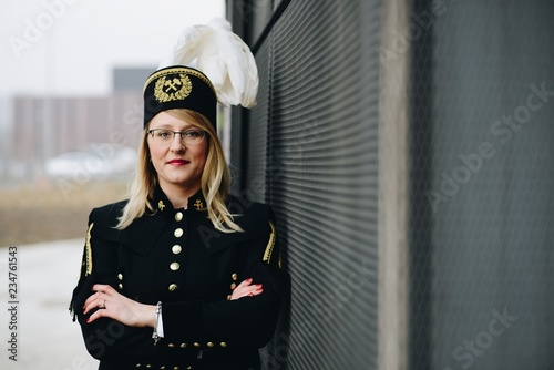 Woman black coal miner foreman in gala parade uniform