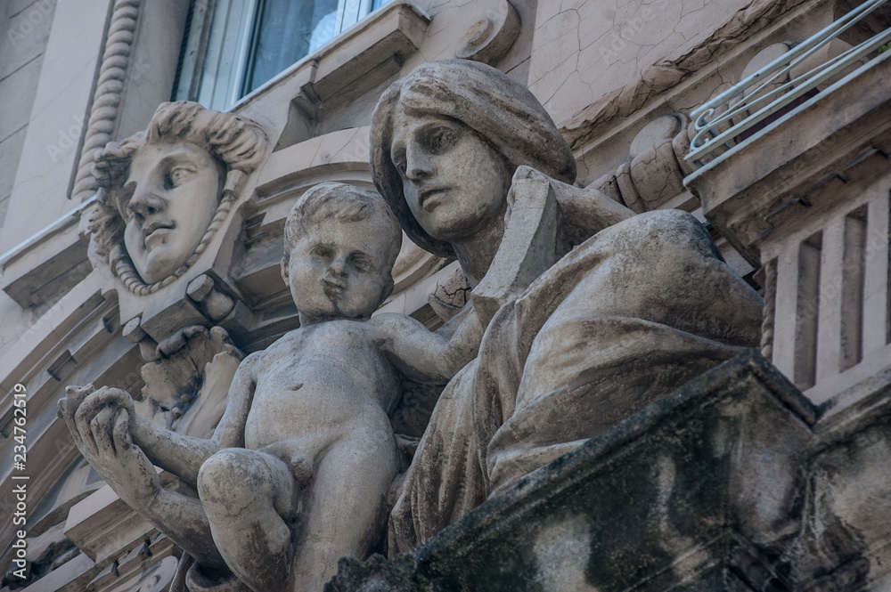 statue of mother and child in Genoa statue of mother and child in Genoa