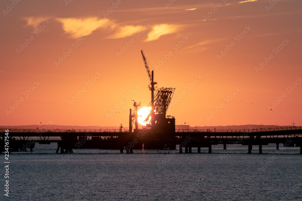Cranes at Sunset, Taken in the River Thames Estuary, Canvey Island, Essex