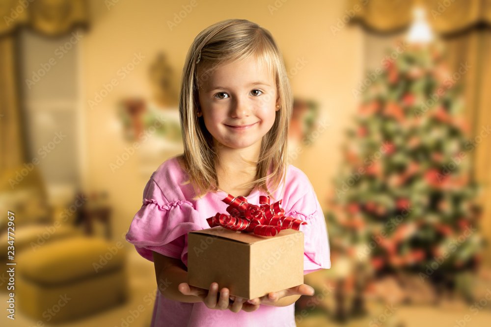 warm photo of girl giving getting small christmas gift present kid toddler tree background warm photo of girl giving getting small christmas gift present kid toddler tree background