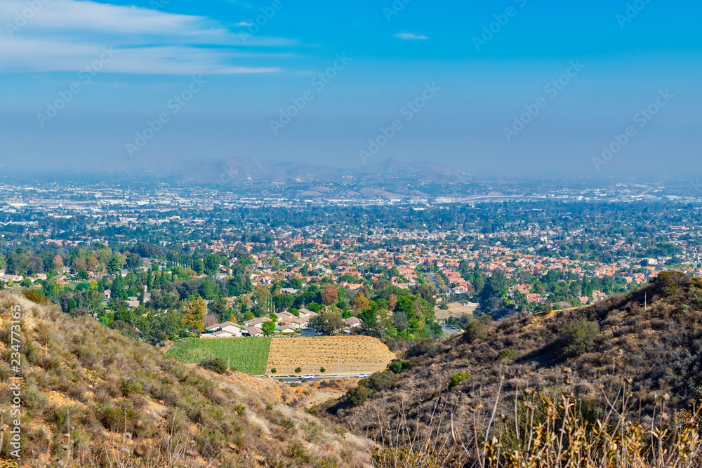 View of inland empire with smog or pollution from fires in the sky
