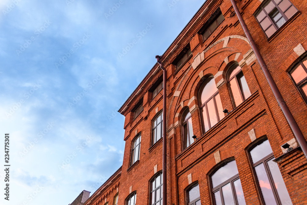 Fototapeta premium Ancient red brick building architecture of St. Petersburg, Russia