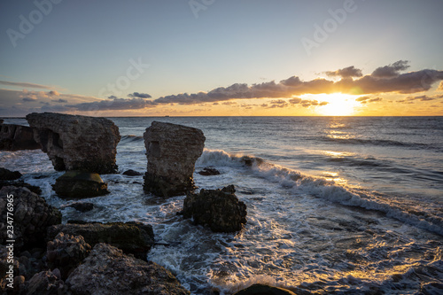 old war fort details of bricks and concrete constructions washed away with sea water waves