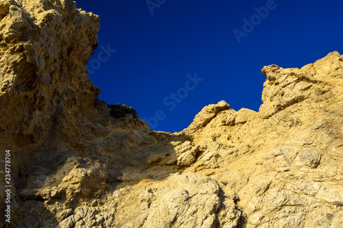 Rock formations in the late afternoon on El Matator State Beach in Malibu, California