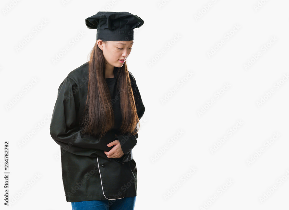Young Chinese woman over isolated background wearing chef uniform with hand on stomach because nausea, painful disease feeling unwell. Ache concept. Young Chinese woman over isolated background wearing chef uniform with hand on stomach because nausea, painful disease feeling unwell. Ache concept.