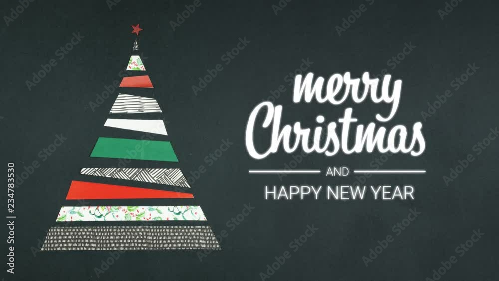 Overhead person hands creating original christmas tree decoration made of gift wraps on dark table.Merry xmas and happy new year text.Vertical top view.holiday season social card background.4k video