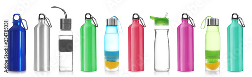 Set with different sport bottles on white background