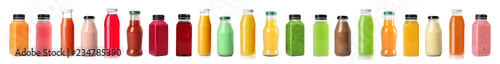 Set with bottles of different juices on white background