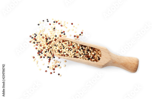 Scoop with mixed quinoa seeds on white background, top view