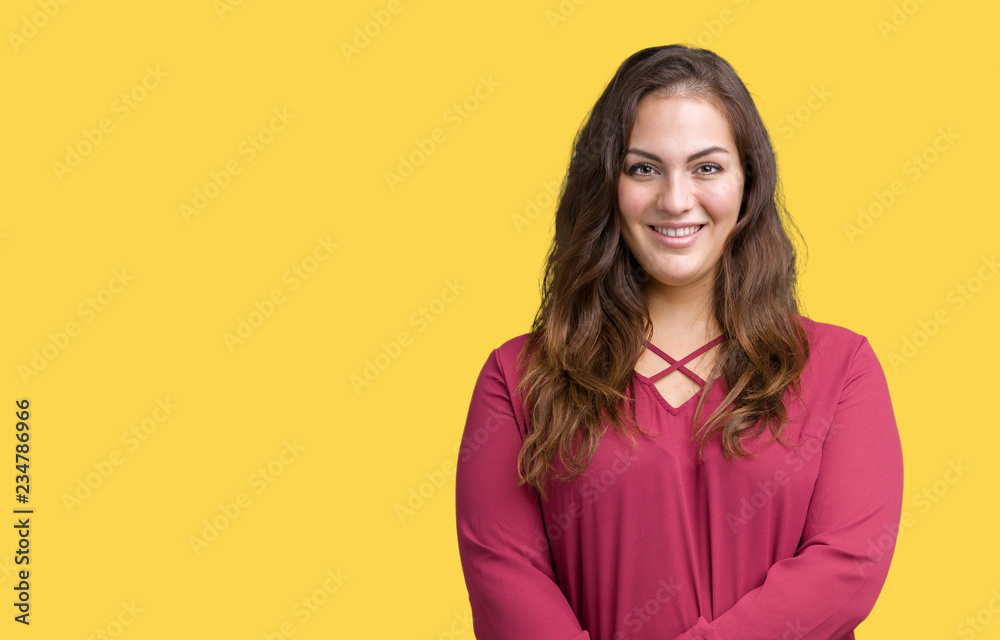 Beautiful plus size young woman over isolated background happy face smiling with crossed arms looking at the camera. Positive person. Beautiful plus size young woman over isolated background happy face smiling with crossed arms looking at the camera. Positive person.