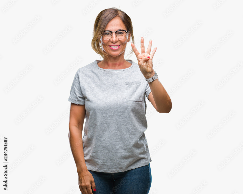 Obraz premium Middle age senior hispanic woman wearing glasses over isolated background showing and pointing up with fingers number four while smiling confident and happy.