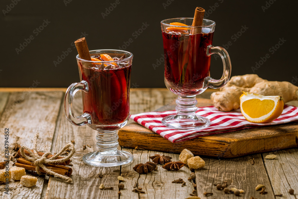 Mulled wine on old wooden background Mulled wine on old wooden background