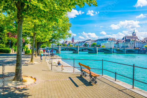 Basler münster and Saint martin church viewed behind the mittlere brücke in Basel, Switzerland