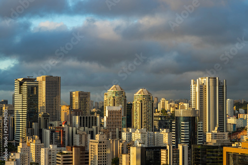 Beautiful sunset between the buildings of the big city. Sao Paulo city Brazil South America. 