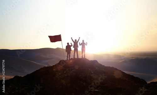 Silhouette of the Business team on top of a mountain . Business Success and Leadership concept. © jamesteohart