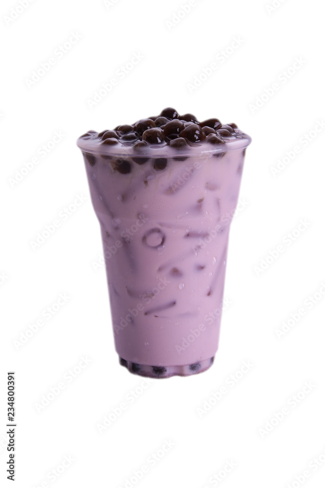 Taro milk tea with iced topping bubble in glass plastic isolated on