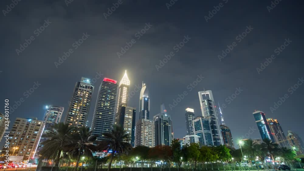 The streets of the night city and skyscrapers of Dubai. Timelapse. The streets of the night city and skyscrapers of Dubai. Timelapse.