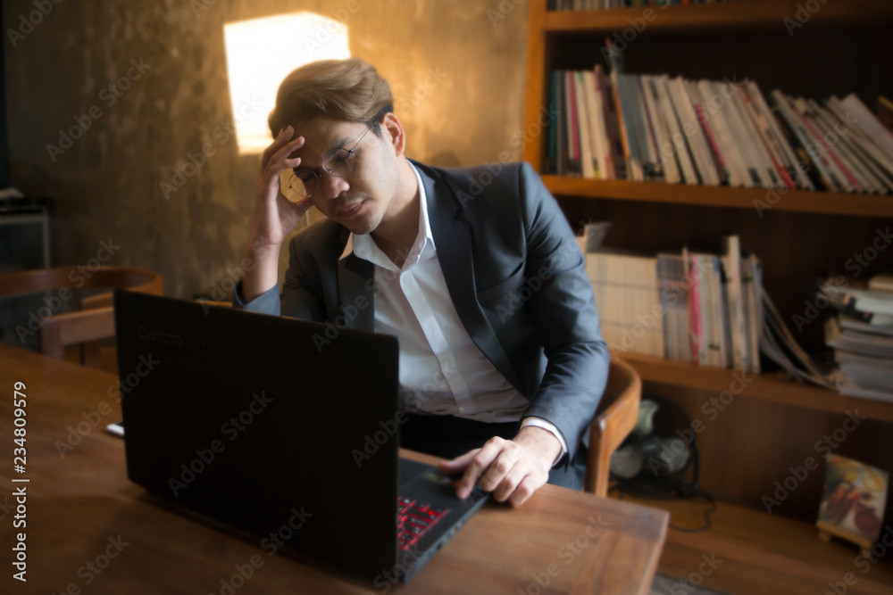 stressed businessman working under pressure in the office. The concept is business,paperwork,failure deadline 