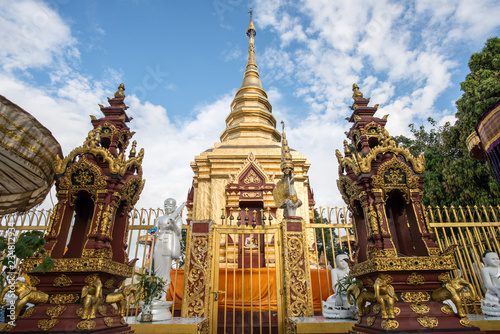 The golden pagoda of Wat Phra That Doi Wao located on the mountains peak in Mae Sai district nearly the border between Thailand and Myanmar. The temple is the perfect spot for border view. © boyloso