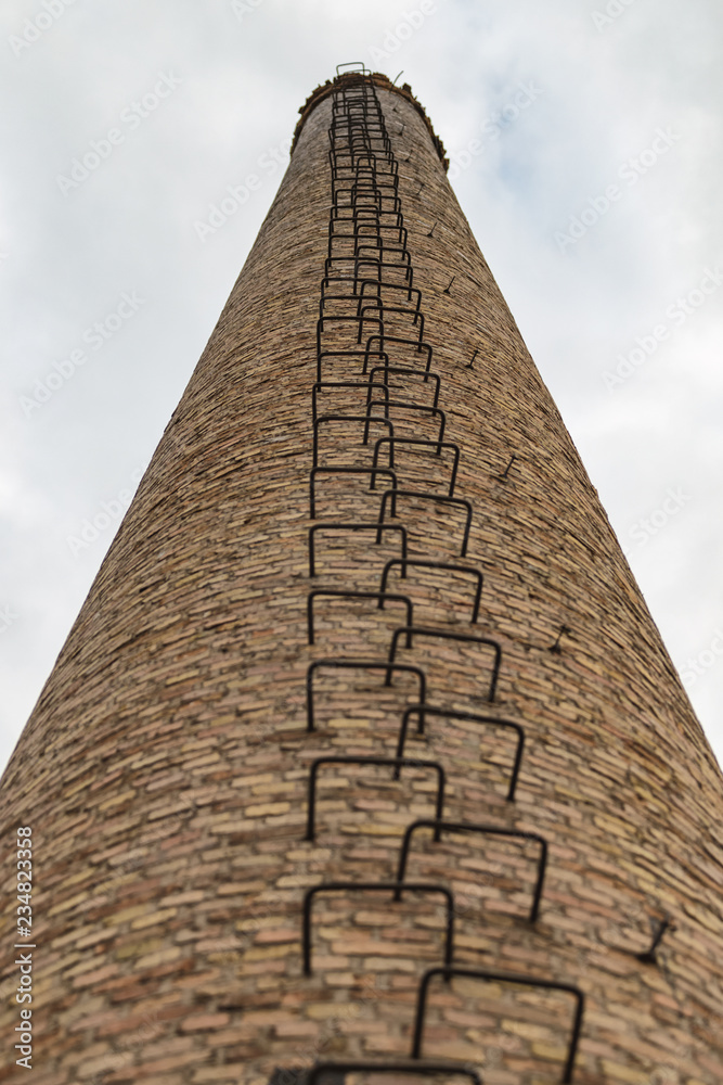 old round brick tower with steps up