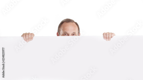 businessman with blank white poster. photo with copy space