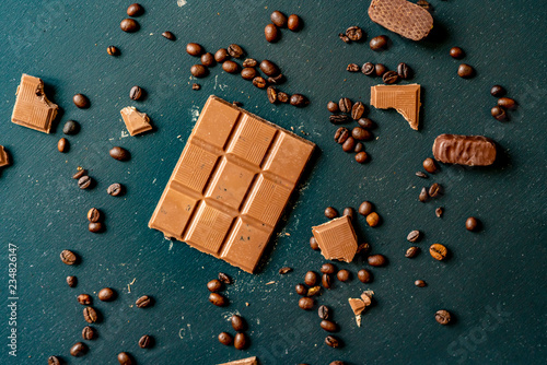 chocolate bar with coffee beans on the dark table flat lay f