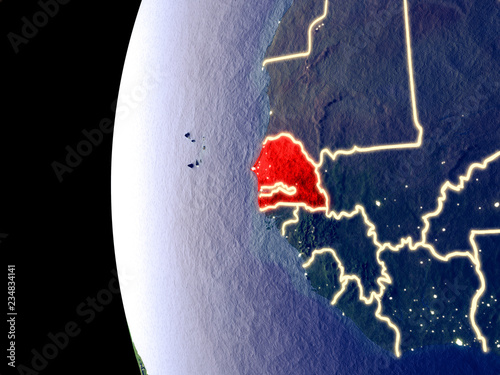 Night view of Senegal from space with visible city lights. Very detailed plastic planet surface.