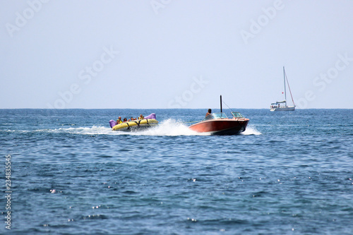 having great fun on crazy ufo, water sport