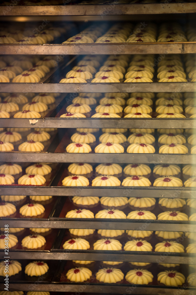 Modern bakery in confectionery factory. Cookies in the oven