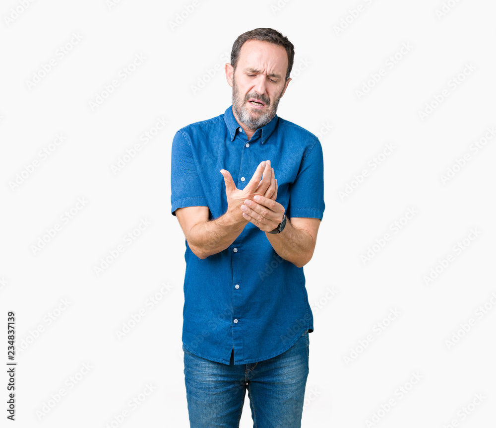 Handsome middle age elegant senior man over isolated background Suffering pain on hands and fingers, arthritis inflammation Handsome middle age elegant senior man over isolated background Suffering pain on hands and fingers, arthritis inflammation
