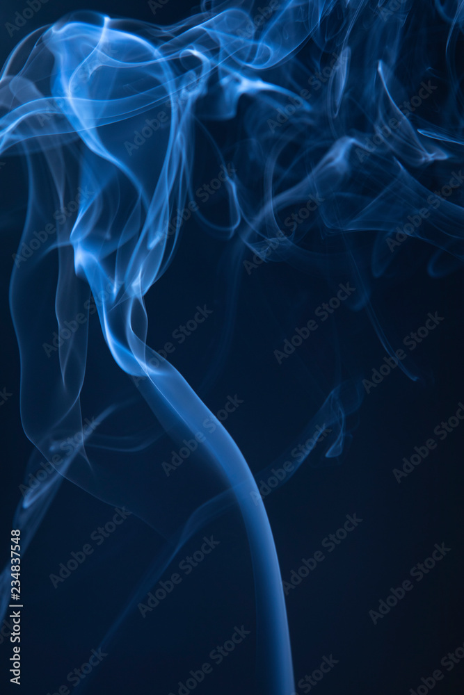 Fototapeta premium Abstract blue smoke swirls