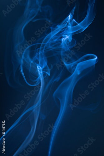 Abstract blue smoke swirls