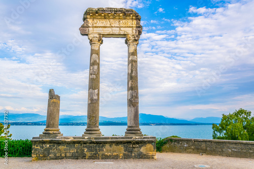 Ruins of an ancient column in Nyon, Switzerland photo