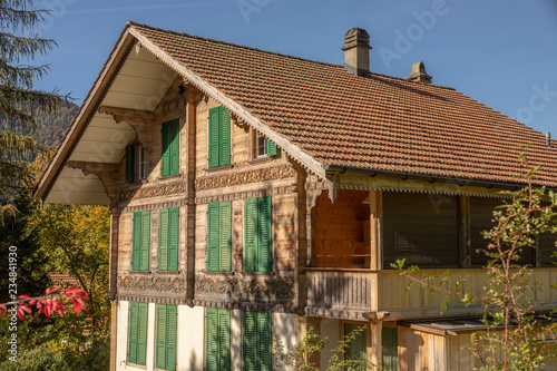 Detail von einem Holzhaus in der Schweiz photo